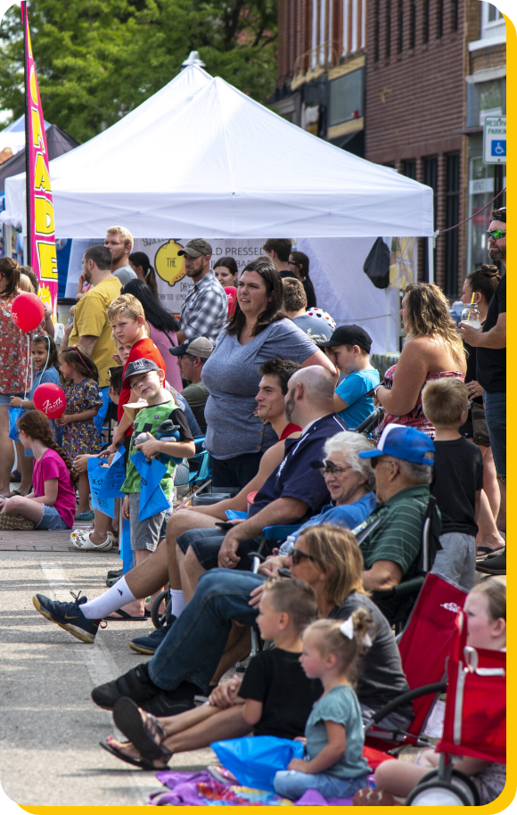 A group of people waiting for the parade to start